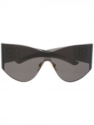 Солнцезащитные очки-маска в массивной оправе с логотипом BB Balenciaga Eyewear. Цвет: черный