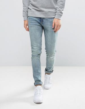 Узкие выбеленные джинсы Cheap Monday. Цвет: синий