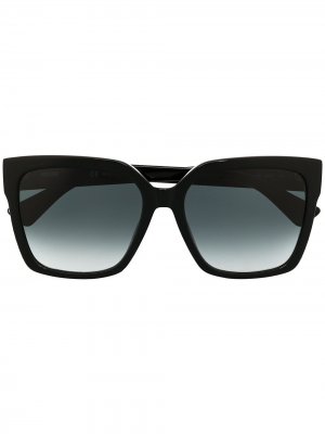 Солнцезащитные очки в квадратной оправе с заклепками Moschino Eyewear. Цвет: черный