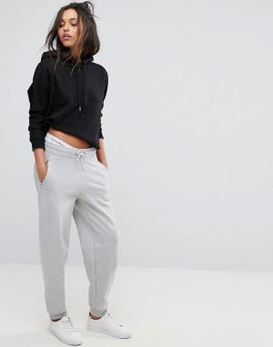 Джоггеры с логотипом  Jeans Calvin Klein. Цвет: серый