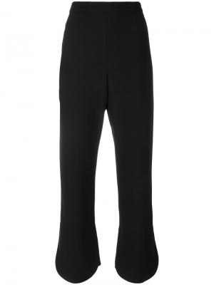 Укороченные расклешенные брюки Prada. Цвет: черный