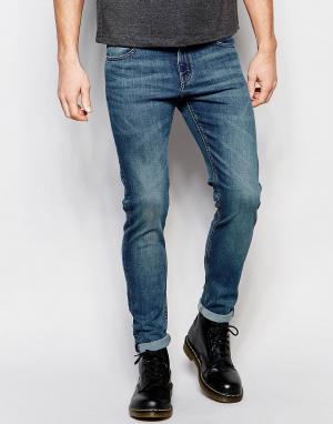 Облегающие джинсы цвета темный индиго Cheap Monday. Цвет: синий