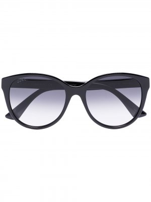 Солнцезащитные очки в круглой оправе с эффектом градиента Gucci Eyewear. Цвет: черный