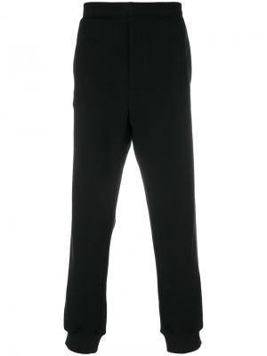 Классические зауженные спортивные брюки Prada. Цвет: черный