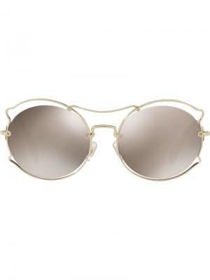 Солнцезащитные очки в оправе крылья бабочки Miu Eyewear. Цвет: золотистый