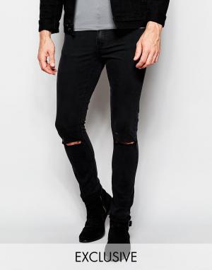 Черные рваные джинсы скинни Cheap Monday. Цвет: черный