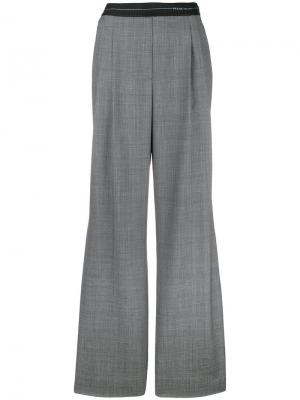 Расклешенные брюки Prince of Wales Prada. Цвет: серый