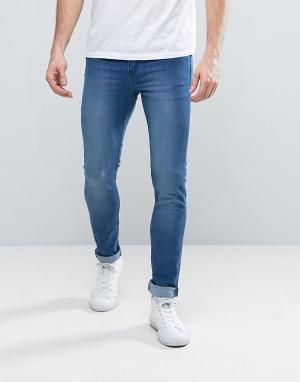 Синие выбеленные узкие джинсы Cheap Monday. Цвет: синий