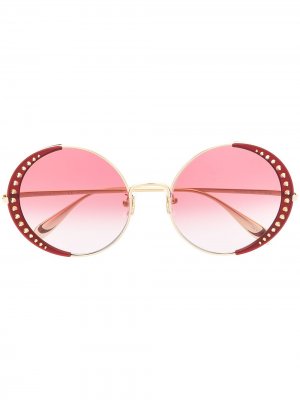 Солнцезащитные очки в круглой оправе с заклепками Alexander McQueen Eyewear. Цвет: золотистый